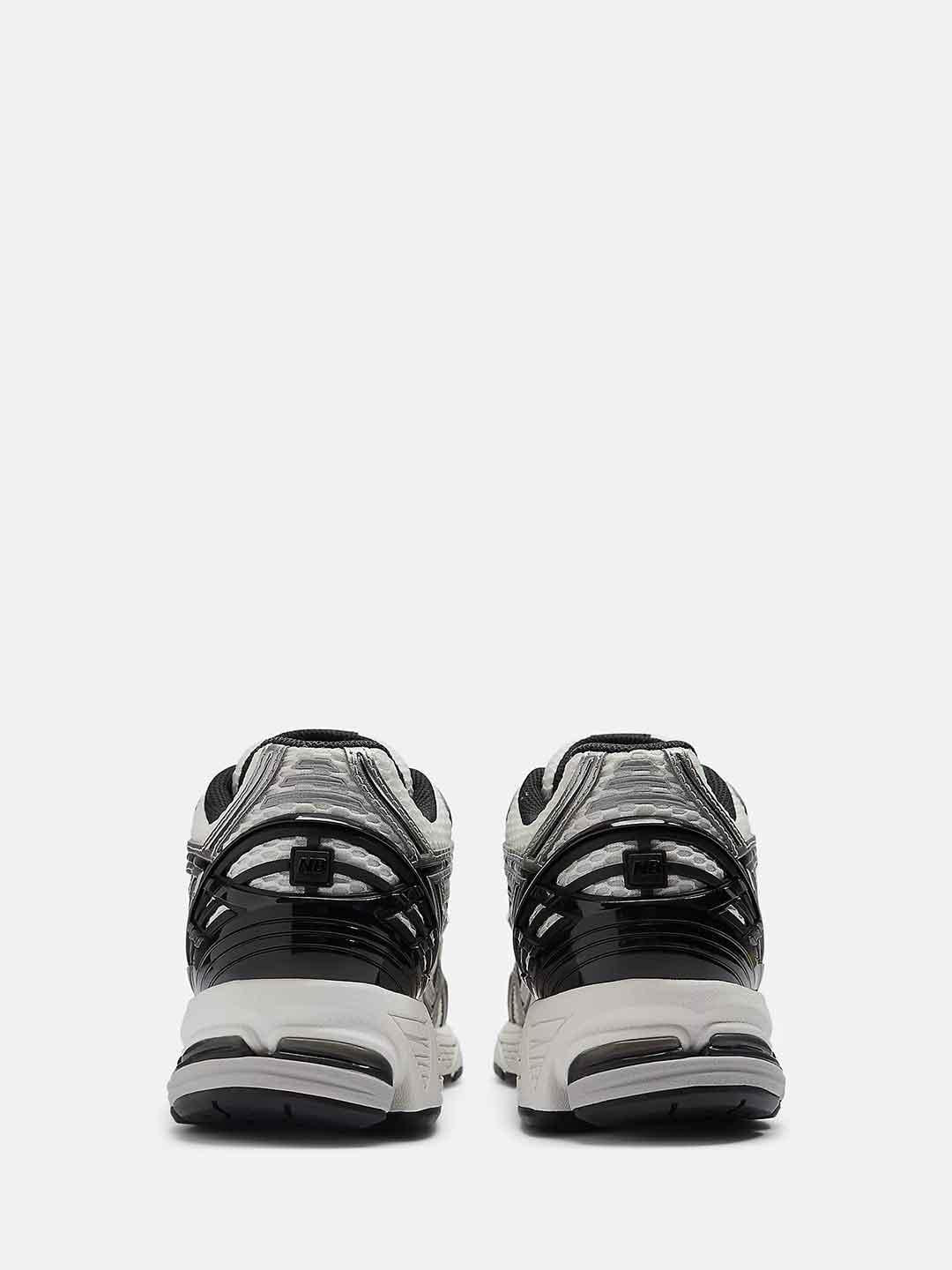 New Balance 1906R sneakers bianco e nero